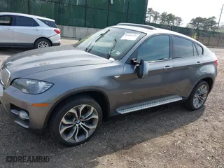 2012 BMW X6 50i with VIN 5UXFG8C57CLZ97446, listed as a IAAI auction lot 42054724 with 131,079 mi miles. Bid and sale history available at carsss.com. Image 14.