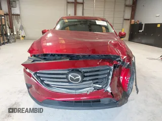 2019 Mazda CX-9 Touring with VIN JM3TCACY1K0331904, listed as a IAAI auction lot 42146945 with 77,699 mi miles and . Bid and sale history available at DreamBid. Image 12.