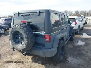 2014 Jeep Wrangler Unlimited Sport with VIN 1C4BJWDG9EL309763, listed as a IAAI auction lot 41378132 with 117,029 mi miles. Bid and sale history available at carsss.com. Image 4.