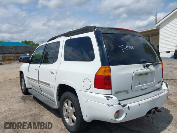 2003 GMC Envoy SLE with VIN 1GKES16S136153880, listed as a IAAI auction lot 42009798 with 289,208 mi miles and . Bid and sale history available at DreamBid. Image 3.