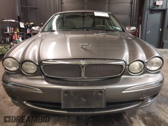 2007 Jaguar X-Type z VIN SAJWA51A37WJ17866, wystawiony jako IAAI lot #41536063 z przebiegiem 121 177 mil mil oraz . Historia ofert i sprzedaży dostępna na DreamBid. Obrazek 6.