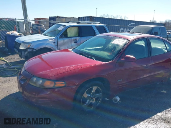 2003 Pontiac Bonneville SLE z VIN 1G2HY52K534159881, wystawiony jako IAAI lot #41604988 z przebiegiem 227 097 mil mil oraz . Historia ofert i sprzedaży dostępna na DreamBid. Obrazek 6.