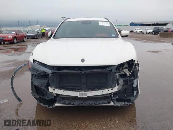 2018 Maserati Levante S GranSport z VIN ZN661YUS5JX301985, wystawiony jako IAAI lot #42180610 z przebiegiem 61 795 mil mil oraz . Historia ofert i sprzedaży dostępna na DreamBid. Obrazek 13.