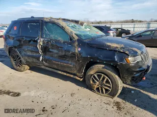 2019 Jeep Grand Cherokee Trailhawk with VIN 1C4RJFLG7KC823624, listed as a Copart auction lot 88843075 with 102,997 mi miles and Salvage Title. Bid and sale history available at carsss.com. Image 4.