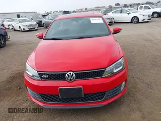 2014 Volkswagen Jetta GLI with VIN 3VW4T7AJ2EM246347, listed as a IAAI auction lot 42553341 with 140,793 mi miles and . Bid and sale history available at DreamBid. Image 12.