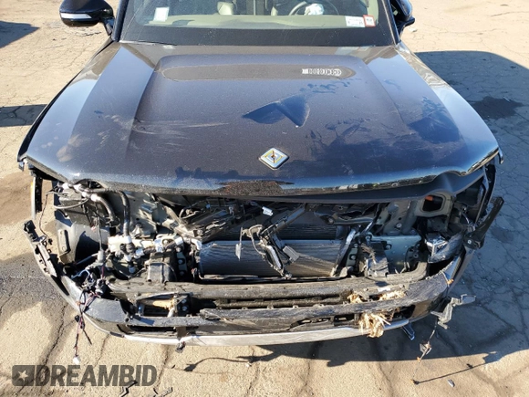 2023 Rivian R1S Adventure with VIN 7PDSGABA2PN014942, listed as a Copart auction lot 88597535 with 0 mi miles and Salvage Title. Bid and sale history available at carsss.com. Image 12.