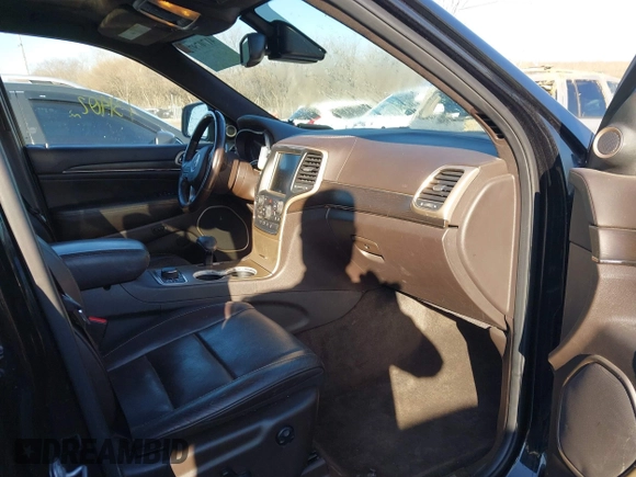 2014 Jeep Grand Cherokee Summit с VIN 1C4RJFJGXEC528136, выставлен на аукционе IAAI как лот 41707972 с пробегом 131 402 миль миль и . История ставок и продаж доступна на DreamBid. Изображение 5.