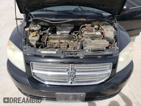 2011 Dodge Caliber Heat with VIN 1B3CB5HA3BD192562, listed as a Copart auction lot 48877855 with 133,588 mi miles and Salvage Title. Bid and sale history available at DreamBid. Image 11.