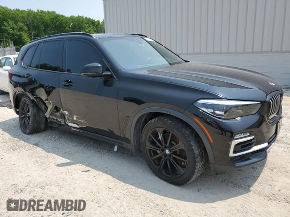 2020 BMW X5 sDrive40i with VIN 5UXCR4C01L9C26104, listed as a Copart auction lot 59191565 with 62,852 mi miles and Clean title. Bid and sale history available at DreamBid. Image 4.