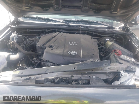 2014 Toyota Tacoma with VIN 5TFLU4EN9EX099414, listed as a IAAI auction lot 40528514 with 122,827 mi miles. Bid and sale history available at carsss.com. Image 10.