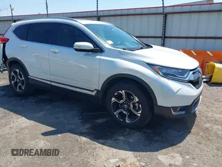 2018 Honda CR-V Touring with VIN 2HKRW2H93JH686298, listed as a IAAI auction lot 41979786 with 100,087 mi miles. Bid and sale history available at carsss.com. Image 1.