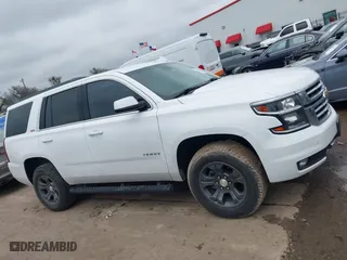2017 Chevrolet Tahoe LT with VIN 1GNSKBKC1HR401044, listed as a IAAI auction lot 41573362 with 103,865 mi miles. Bid and sale history available at carsss.com. Image 13.