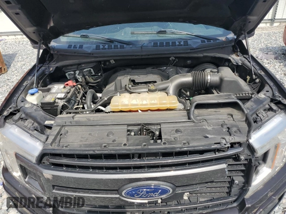 2018 Ford F-150 XL with VIN 1FTEX1CP7JKD78368, listed as a Copart auction lot 55904385 with 126,812 mi miles and Salvage title. Bid and sale history available at DreamBid. Image 11.