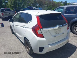 2015 Honda Fit EX z VIN 3HGGK5G84FM733886, wystawiony jako IAAI lot #42298129 z przebiegiem 84 383 mil mil oraz . Historia ofert i sprzedaży dostępna na DreamBid. Obrazek 3.