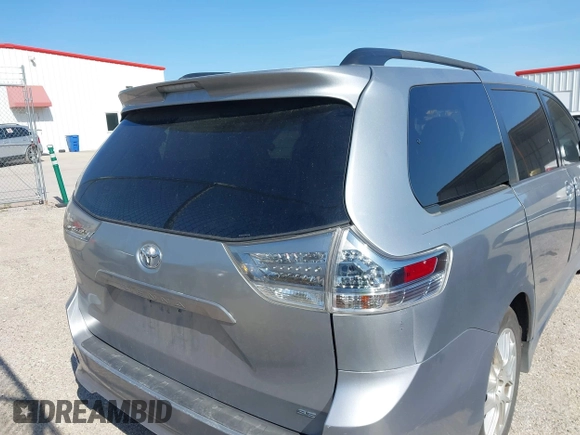 2011 Toyota Sienna SE with VIN 5TDXK3DC8BS131434, listed as a IAAI auction lot 42002675 with 209,396 mi miles. Bid and sale history available at carsss.com. Image 17.