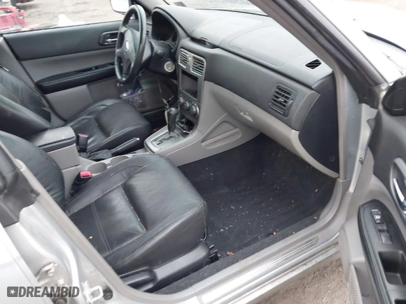 2004 Subaru Forester (Natl) XT with VIN JF1SG69694H733997, listed as a IAAI auction lot 41459463 with 219,973 mi miles. Bid and sale history available at carsss.com. Image 5.