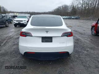 2020 Tesla Model Y Long Range with VIN 5YJYGDEE4LF044843, listed as a IAAI auction lot 41799504 with 40,770 mi miles and . Bid and sale history available at DreamBid. Image 16.