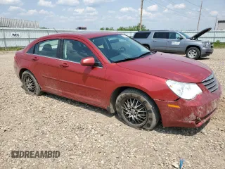 2010 Chrysler Sebring Limited with VIN 1C3CC5FD1AN197099, listed as a Copart auction lot 59128825 with 85,736 mi miles and Salvage title. Bid and sale history available at DreamBid. Image 4.