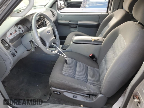 2003 Ford Explorer Sport XLS z VIN 1FMZU70E53UB36259, wystawiony jako Copart lot #73843824 z przebiegiem 124 362 mil mil oraz Nie do naprawy • Non repairable. Historia ofert i sprzedaży dostępna na DreamBid. Obrazek 7.