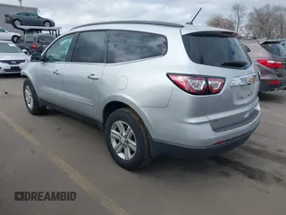 2013 Chevrolet Traverse LT with VIN 1GNKVGKD6DJ240146, listed as a IAAI auction lot 41665024 with 118,648 mi miles and . Bid and sale history available at DreamBid. Image 3.