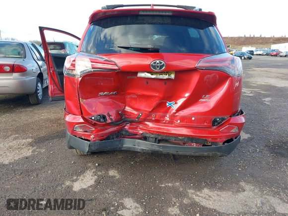 2016 Toyota RAV4 LE with VIN JTMBFREVXGJ100692, listed as a IAAI auction lot 41847333 with 130,822 mi miles. Bid and sale history available at carsss.com. Image 6.
