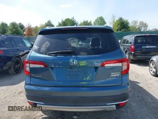 2020 Honda Pilot Touring 8-Passenger with VIN 5FNYF6H93LB034009, listed as a IAAI auction lot 42090993 with 73,325 mi miles and . Bid and sale history available at carsss.com. Image 16.