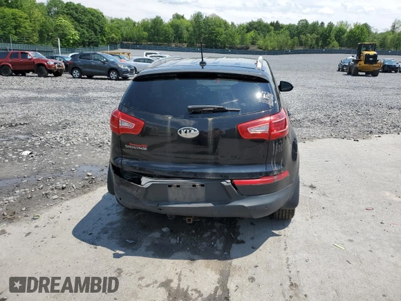 2013 Kia Sportage LX z VIN KNDPBCA27D7489178, wystawiony jako Copart lot #59559795 z przebiegiem 183 659 mil mil oraz Szkoda całkowita • Salvage title. Historia ofert i sprzedaży dostępna na DreamBid. Obrazek 6.