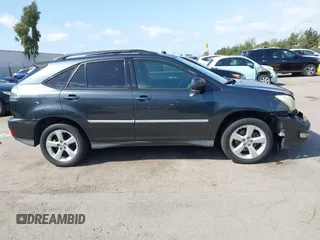 2007 Lexus RX 350 with VIN JTJGK31U970002140, listed as a IAAI auction lot 41939945 with 163,969 mi miles. Bid and sale history available at carsss.com. Image 13.