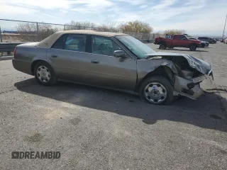 2002 Cadillac DeVille DHS z VIN 1G6KE57Y22U291523, wystawiony jako Copart lot #45711095 z przebiegiem 160 364 mil mil oraz Szkoda całkowita • Salvage title. Historia ofert i sprzedaży dostępna na DreamBid. Obrazek 4.