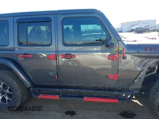 2020 Jeep Wrangler Unlimited Rubicon with VIN 1C4HJXFG3LW291155, listed as a IAAI auction lot 41348485 with 72,481 mi miles and . Bid and sale history available at DreamBid. Image 13.
