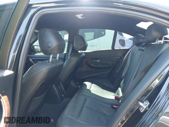 2014 BMW 3 Series 328i with VIN WBA3C1C54EK117252, listed as a IAAI auction lot 42338440 with 126,877 mi miles and . Bid and sale history available at DreamBid. Image 8.