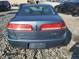 2012 Lincoln MKZ z VIN 3LNHL2GCXCR827302, wystawiony jako Copart lot #70519604 z przebiegiem 150 416 mil mil oraz Szkoda całkowita • Salvage title. Historia ofert i sprzedaży dostępna na DreamBid. Obrazek 6.