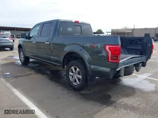 2015 Ford F-150 XLT w/HD Payload Pkg with VIN 1FTFW1EG6FFB62533, listed as a IAAI auction lot 41828378 with 130,033 mi miles. Bid and sale history available at carsss.com. Image 3.