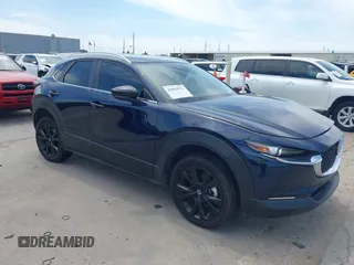 2024 Mazda CX-30 S Select Sport z VIN 3MVDMBBM1RM655682, wystawiony jako IAAI lot #42063971 z przebiegiem 6 771 mil mil oraz . Historia ofert i sprzedaży dostępna na DreamBid. Obrazek 1.