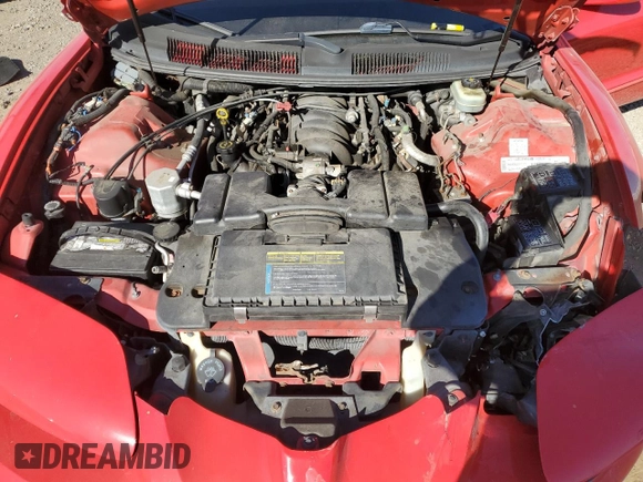 2001 Pontiac Firebird Formula z VIN 2G2FV22G112117625, wystawiony jako Copart lot #81836394 z przebiegiem 142 503 mil mil oraz Szkoda całkowita • Salvage title. Historia ofert i sprzedaży dostępna na DreamBid. Obrazek 13.