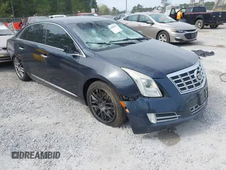 2013 Cadillac XTS Premium with VIN 2G61S5S31D9196354, listed as a IAAI auction lot 41905983 with 197,605 mi miles. Bid and sale history available at carsss.com. Image 1.