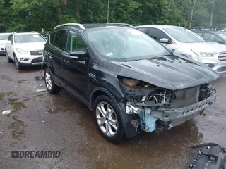 2015 Ford Escape Titanium with VIN 1FMCU0JX0FUA99011, listed as a IAAI auction lot 42597859 with 132,909 mi miles and . Bid and sale history available at DreamBid. Image 1.