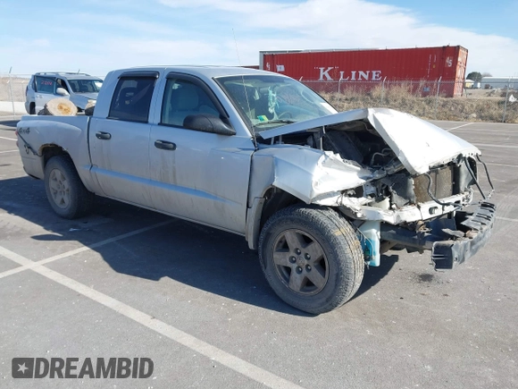 2005 Dodge Dakota SLT with VIN 1D7HW48N45S127702, listed as a IAAI auction lot 41492769 with Not Provided miles. Bid and sale history available at carsss.com. Image 1.