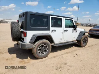 2012 Jeep Wrangler Unlimited Sport with VIN 1C4BJWDG9CL187421, listed as a Copart auction lot 61411145 with 140,390 mi miles and Clean title. Bid and sale history available at DreamBid. Image 3.