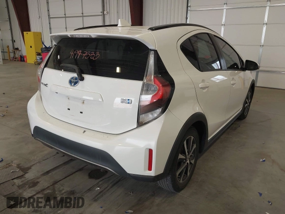 2018 Toyota Prius One with VIN JTDKDTB38J1599974, listed as a IAAI auction lot 41977533 with 71,225 mi miles and . Bid and sale history available at DreamBid. Image 4.