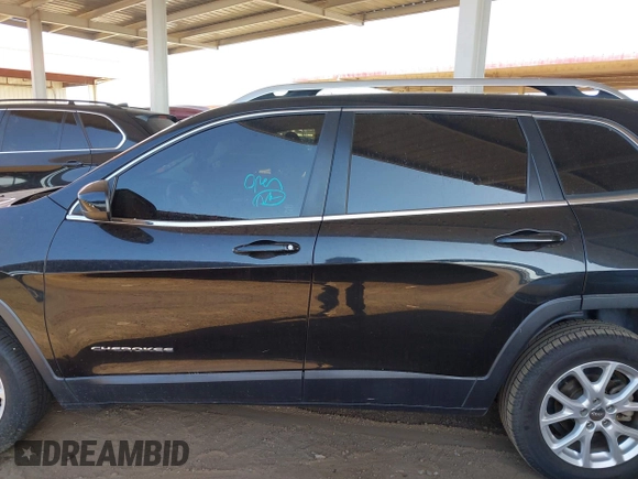 2015 Jeep Cherokee Latitude with VIN 1C4PJLCB8FW669150, listed as a IAAI auction lot 42122669 with 194,525 mi miles and . Bid and sale history available at DreamBid. Image 14.