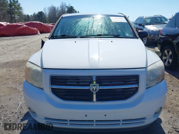 2011 Dodge Caliber Heat with VIN 1B3CB5HA6BD179014, listed as a IAAI auction lot 41704508 with 188,127 mi miles and . Bid and sale history available at DreamBid. Image 12.