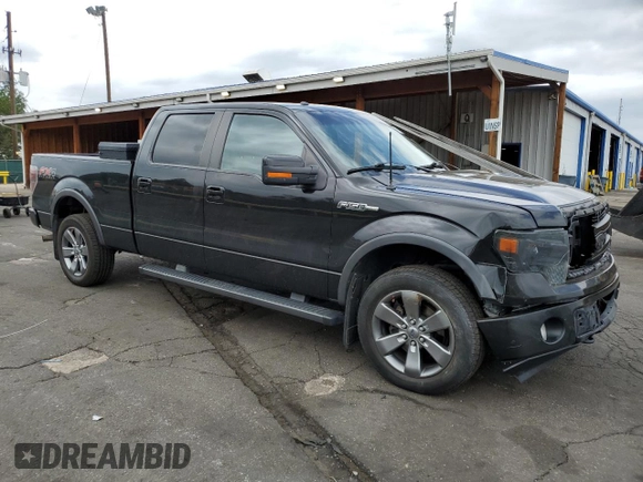 2014 Ford F-150 XL with VIN 1FTFW1EF1EFC21428, listed as a Copart auction lot 62192815 with 171,620 mi miles and Salvage title. Bid and sale history available at DreamBid. Image 4.