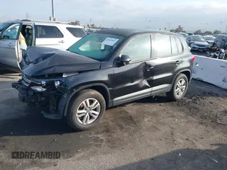 2012 Volkswagen Tiguan LE z VIN WVGAV7AX8CW531387, wystawiony jako IAAI lot #41603812 z przebiegiem 154 147 mil mil oraz . Historia ofert i sprzedaży dostępna na DreamBid. Obrazek 2.