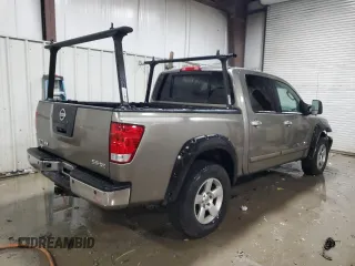 2007 Nissan Titan SE z VIN 1N6BA07B07N221489, wystawiony jako Copart lot #83408574 z przebiegiem 92 831 mil mil oraz Szkoda całkowita • Salvage title. Historia ofert i sprzedaży dostępna na DreamBid. Obrazek 3.
