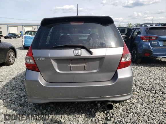 2007 Honda Fit Sport z VIN JHMGD37677S001013, wystawiony jako Copart lot #58792605 z przebiegiem 157 960 mil mil oraz Czysty tytuł • Clean title. Historia ofert i sprzedaży dostępna na DreamBid. Obrazek 6.