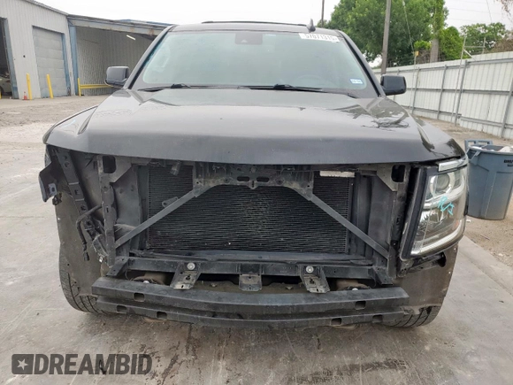 2020 Chevrolet Tahoe LT with VIN 1GNSCBKC5LR203301, listed as a Copart auction lot 57071315 with 106,376 mi miles and Salvage title. Bid and sale history available at DreamBid. Image 5.