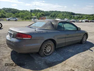 2005 Chrysler Sebring Touring z VIN 1C3EL55R55N625039, wystawiony jako Copart lot #58078465 z przebiegiem 158 906 mil mil oraz Tytuł czysty. Historia ofert i sprzedaży dostępna na DreamBid. Obrazek 3.