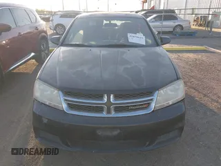 2014 Dodge Avenger SE with VIN 1C3CDZABXEN144000, listed as a IAAI auction lot 41878635 with 153,097 mi miles and . Bid and sale history available at DreamBid. Image 6.