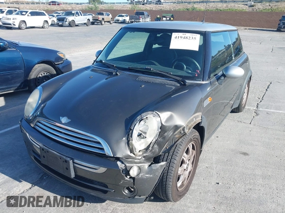 2006 MINI Hardtop with VIN WMWRC33586TJ75043, listed as a IAAI auction lot 41948235 with 138,402 mi miles and . Bid and sale history available at DreamBid. Image 18.